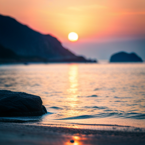 夕日が沈む海岸線が見えるビーチ